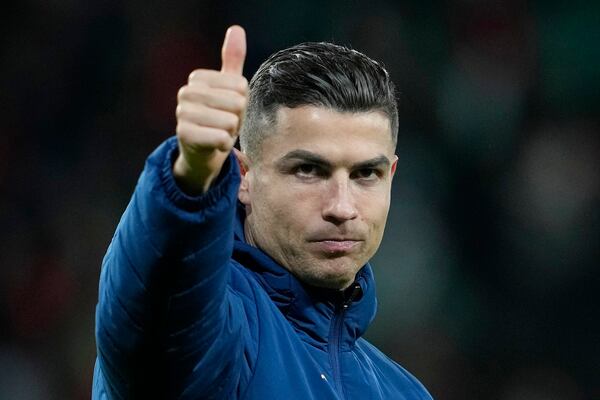 Portugal's Cristiano Ronaldo gestures to the crowd after winning the UEFA Nations League soccer match between Portugal and Denmark, at the Jose Alvalade Stadium in Lisbon, Sunday, March 23, 2025. (AP Photo/Armando Franca)