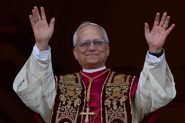 Newly elected Pope Leo XIV appears at the balcony of St. Peter's Basilica at the Vatican, Thursday, May 8, 2025. (AP Photo/Andrew Medichini)