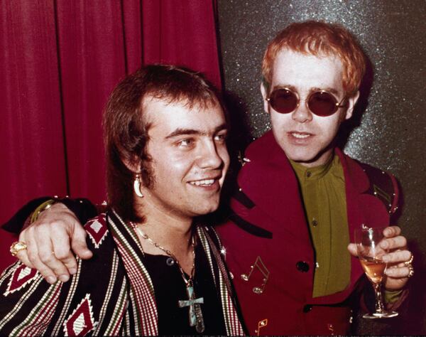 FILE - British pop idol Elton John, right, appears with his lyricist Bernie Taupin in London on March 5, 1973. (AP Photo/John Glanvill, File)