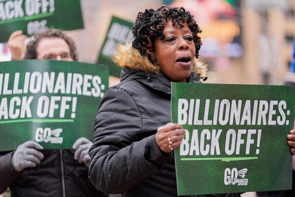 Demonstrators gather outside of the Edward A. Garmatz United States District Courthouse in Baltimore, on Friday, March 14, 2025, before a hearing regarding the Department of Government Efficiency's access to Social Security data. (AP Photo/Stephanie Scarbrough)