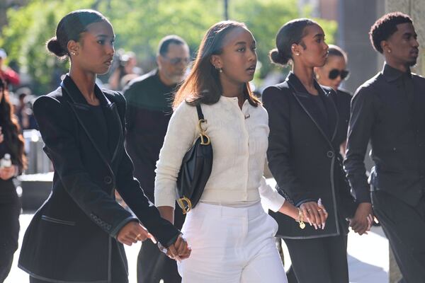Family and supporters of Sean "Diddy" Combs arrive to the courthouse in New York, Monday, May 12, 2025. (AP Photo/Seth Wenig)