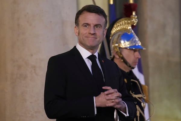 French President Emmanuel Macron waits for Moldova's President Maia Sandu Monday, March 10, 2025 at the Elysee Palace in Paris. (AP Photo/Christophe Ena)