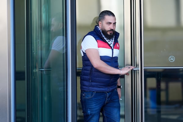 Odai Alfayoumi, father of six-year-old Palestinian boy Wadee Alfayoumi, leaves Will County Courthouse where Joseph Czuba, 73, is charged with and on trial in the fatal stabbing of the boy and the wounding of his mother Hanan Shaheen, Tuesday, Feb. 25, 2025, in Joliet, Ill. (AP Photo/Erin Hooley)