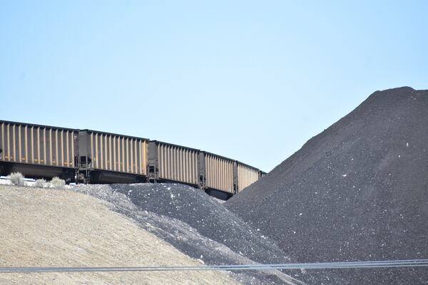 A train is seen entering the Bull Mountains Mine, which ships coal to customers in Japan and South Korea, on May 21, 2025, near Roundup, Montana. (AP Photo/Matthew Brown)