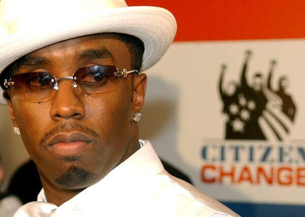 FILE - Sean 'P.' Diddy' Combs arrives at the annual Independence Day 'White Party' at the PlayStation 2 Estate in Bridgehampton, New York, July 4, 2004. (AP Photo/Jennifer Szymaszek, File)