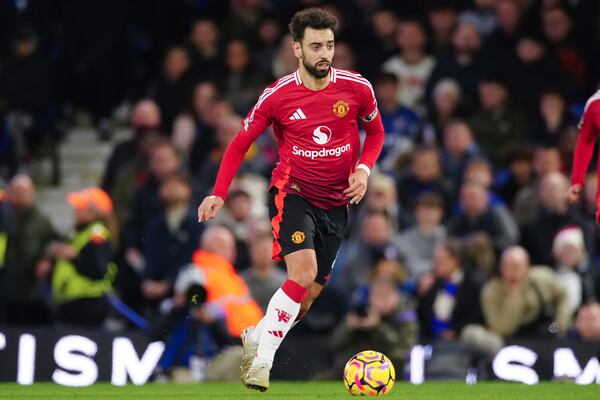 FILE - Manchester United's Bruno Fernandes runs with the ball during the English Premier League soccer match between Ipswich Town and Manchester United at Portman Road stadium in Ipswich, England, Sunday, Nov. 24, 2024. (AP Photo/Dave Shopland, File)