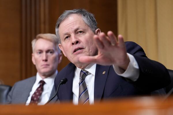 Sen. Steve Daines, R-Mont., speaks at the Senate Finance Committee confirmation hearing for Scott Bessent, President-elect Donald Trump's choice to be Secretary of the Treasury, at the Capitol in Washington, Thursday, Jan. 16, 2025. (AP Photo/Ben Curtis)