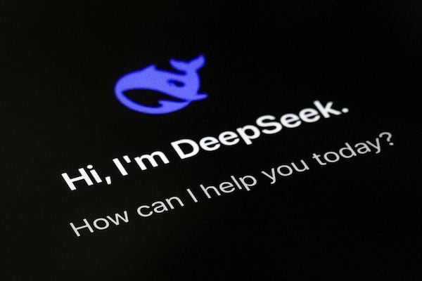 The smartphone apps DeepSeek page is seen on a smartphone screen in Beijing, Tuesday, Jan. 28, 2025. (AP Photo/Andy Wong)