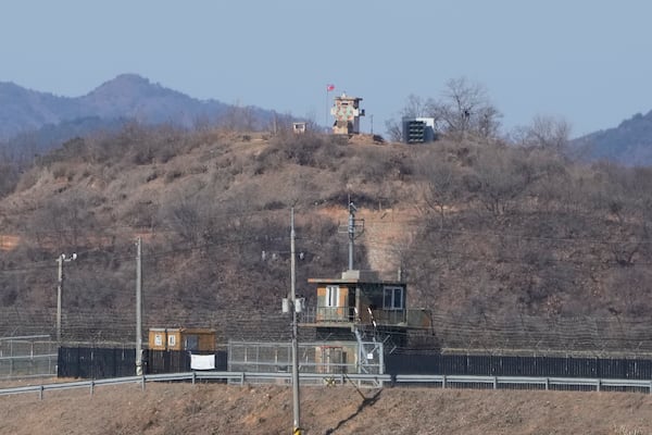 A North Korean military guard post, top, and a South Korean post, bottom, are seen from Paju, South Korea, near the border with North Korea, Tuesday, Feb. 18, 2025. (AP Photo/Ahn Young-joon)