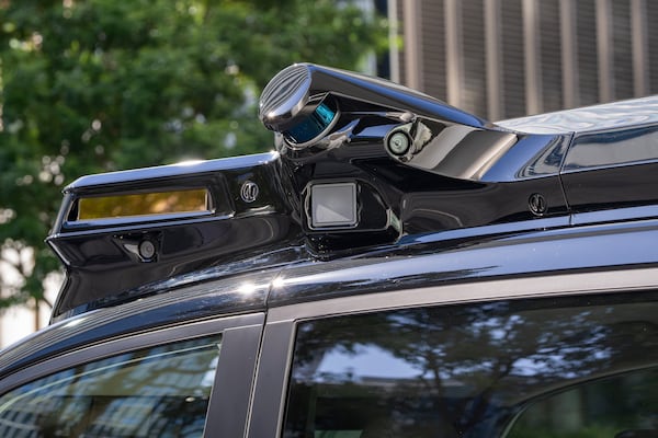 This photo released by Nissan Motor Corp., shows sensors attached on top of its car which work for the Japanese automaker’s self-driving technology with computer functions, radars and cameras while the vehicle drives along a street in Yokohama, near Tokyo in February 2025. (Nissan Motor Corp. via AP)