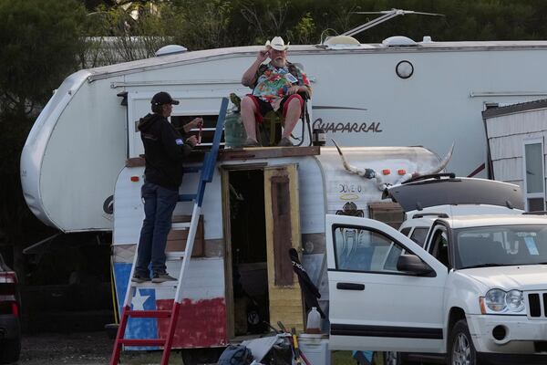 Visitor pack up after the SpaceX mega rocket Starship test flight from Starbase was scrubbed in Boca Chica, Texas, Monday, March 3, 2025. (AP Photo/Eric Gay)