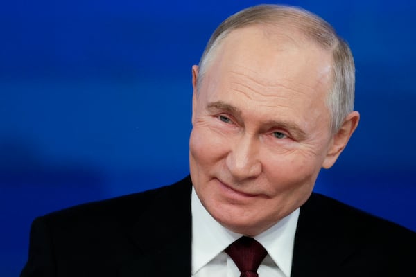 Russian President Vladimir Putin smiles during his annual news conference and call-in show at Gostinny Dvor in Moscow, Russia, Thursday, Dec. 19, 2024. (Gavriil Grigorov, Sputnik, Kremlin Pool Photo via AP)