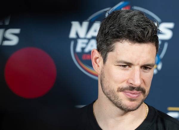 Canada's Sidney Crosby speaks to the media following 4 Nations Face-Off hockey practice in Brossard, Que., on Monday, Feb. 10, 2025. Canada will face Sweden on Feb. 12. (Christinne Muschi/The Canadian Press via AP)