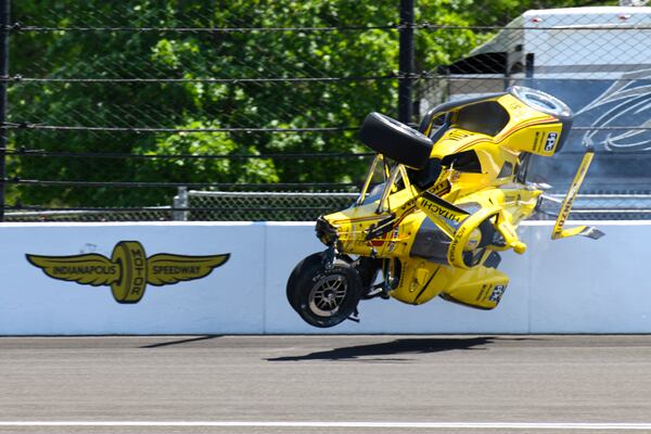 The car driven by Scott McLaughlin, of New Zealand, becomes airborne after hitting the wall in the second turn during practice for the Indianapolis 500 auto race at Indianapolis Motor Speedway in Indianapolis, Sunday, May 18, 2025.(AP Photo/Jamie Gallagher)