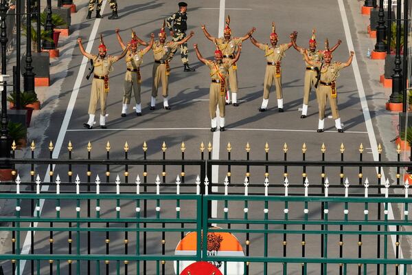 Indian Border Security Forces soldiers gesture during a daily closing ceremony at the Wagah, a joint post on the Pakistan and India border, near Lahore, Pakistan, Monday, May 5, 2025. (AP Photo/K.M. Chaudary)