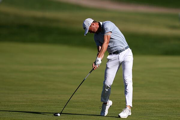 Justin Thomas hits on the 15th hole during the third round of the Truist Championship golf tournament at the Philadelphia Cricket Club, Saturday, May 10, 2025, in Flourtown. (AP Photo/Matt Rourke)