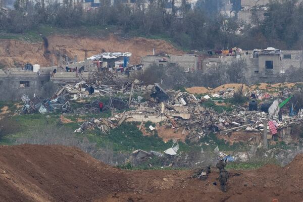 Israeli soldiers take positions near destroyed buildings inside the northern Gaza Strip as seen from southern Israel, Sunday, Feb. 9, 2025. (Photo/Ohad Zwigenberg)