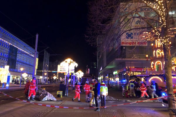 Emergency services attend an incident at the Christmas market in Magdeburg, Germany, Friday Dec. 20, 2024. (Dörthe Hein/dpa via AP)