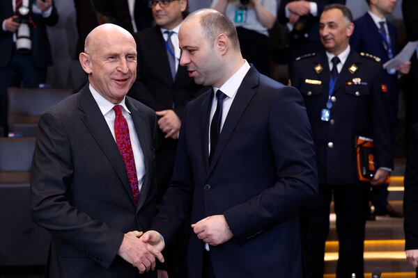 Britain's Defense Secretary John Healey, left, speaks with North Macedonia's Defense Minister Vlado Misajlovski during a meeting of the North Atlantic Council in defense ministers format at NATO headquarters in Brussels, Thursday, Feb. 13, 2025. (AP Photo/Geert Vanden Wijngaert)