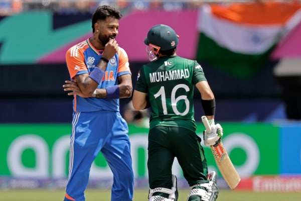 India's Hardik Pandya, left, interacts with Pakistan's Mohammad Rizwan during the ICC Men's T20 World Cup cricket match between India and Pakistan at the Nassau County International Cricket Stadium in Westbury, New York, June 9, 2024. (AP Photo/Adam Hunger, File)