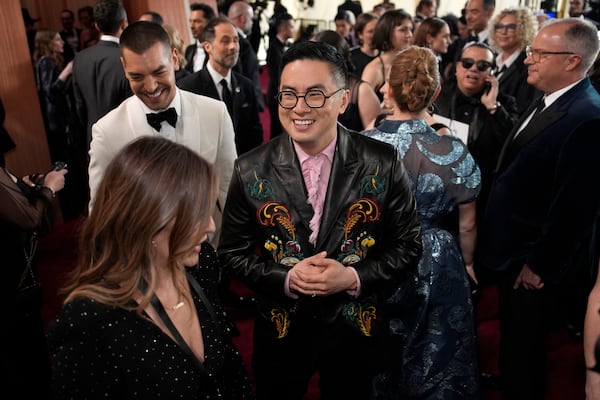 Bowen Yang arrives at the Oscars on Sunday, March 2, 2025, at the Dolby Theatre in Los Angeles. (AP Photo/John Locher)