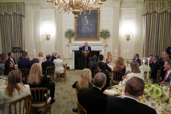 President Donald Trump speaks during a Kennedy Center board dinner in the State Dining Room at the White House, Monday, May 19, 2025, in Washington. (AP Photo/Manuel Balce Ceneta)