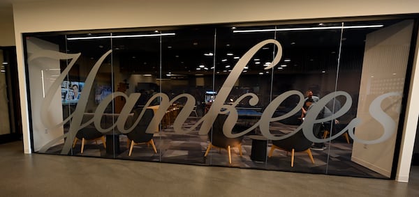 Members of the media check out a game room next to the New York Yankees clubhouse kitchen during a tour of the upgraded team spring training facilities Thursday, Feb. 13, 2025, at George M. Steinbrenner Field in Tampa, Fla. (AP Photo/Steve Nesius)