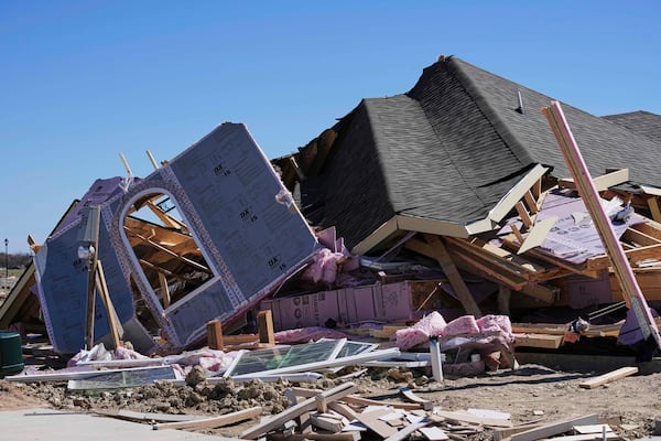 Homes that were under construction sit destroyed after recent severe weather passed through the area in Haslet, Texas, Wednesday, March 5, 2025. (AP Photo/Tony Gutierrez)