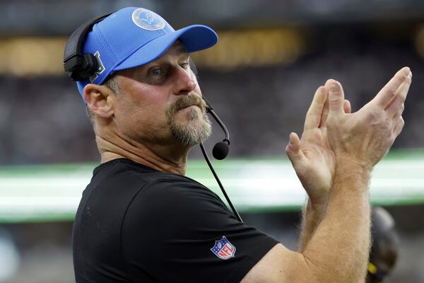 FILE - Detroit Lions head coach Dan Campbell claps during an NFL football game against the Dallas Cowboys, Sunday, Oct. 13, 2024, in Arlington, Texas. (AP Photo/Matt Patterson, File)