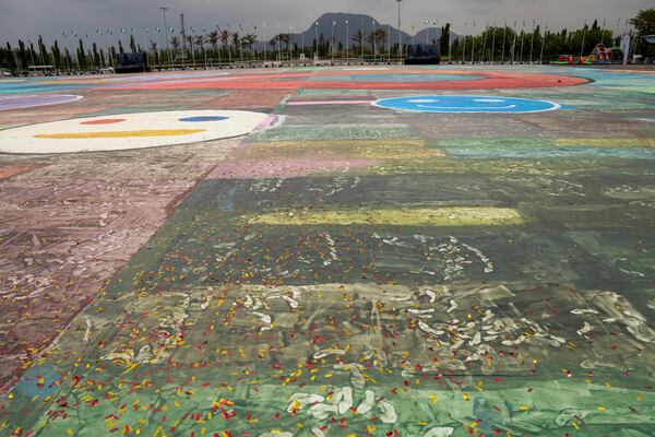 An Ariel view of the canvas painting by Kanyeyachukwu Tagbo-Okeke, a 15-year-old autistic artist who won the Guinness World Record for the largest art canvas, on display at the Eagle Square on World Autism Day in Abuja, Nigeria, Wednesday, April 2, 2025. (AP Photo/David Durowaiye)