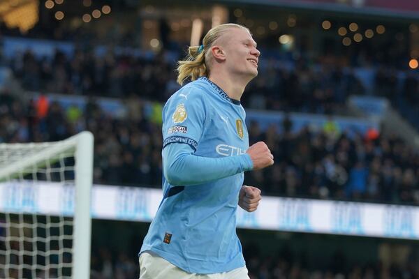 Manchester City's Erling Haaland celebrates after scoring his side's 2nd goal against West Ham during a English Premier League soccer match at Etihad stadium in Manchester, England, Saturday, Jan. 4, 2025. (AP Photo/Ian Hodgson)