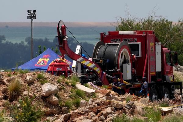 Rescuers work to retrieve miners from ground in an abandoned gold mine for months, in Stilfontein, South Africa, Tuesday, Jan. 14, 2025. (AP Photo/Themba Hadebe)