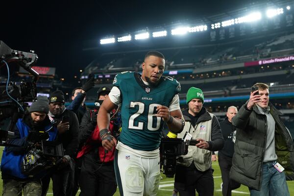 Philadelphia Eagles running back Saquon Barkley (26) leaves the field after an NFL wild-card playoff football game against the Green Bay Packers on Sunday, Jan. 12, 2025, in Philadelphia. (AP Photo/Matt Slocum)