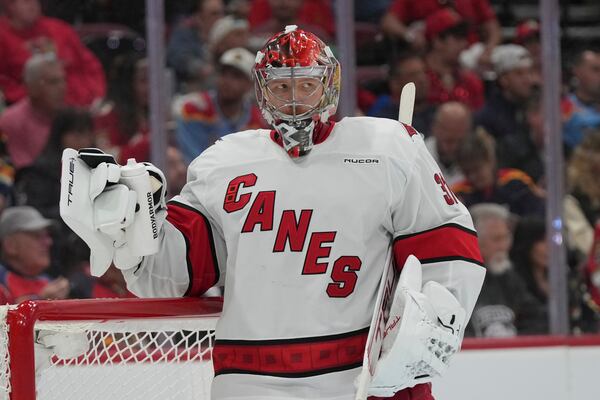 Carolina Hurricanes goaltender Frederik Andersen (31) takes a break during the second period in Game 4 of the NHL hockey Stanley Cup Eastern Conference finals against the Florida Panthers, Monday, May 26, 2025, in Sunrise, Fla. (AP Photo/Lynne Sladky)