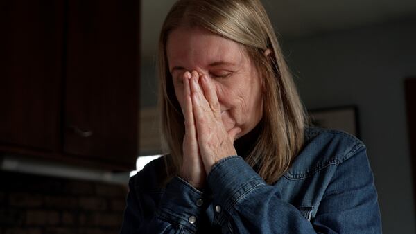 Barbara Teed unpacks a Meals on Wheels deliver for herself and her 30-year-old son Ryan, who has Down syndrome, on Wednesday, Jan. 29, 2025, in Bloomington, Minn. (AP photo/Mark Vancleave)