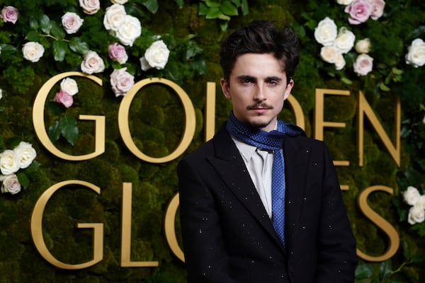 Timothee Chalamet arrives at the 82nd Golden Globes on Sunday, Jan. 5, 2025, at the Beverly Hilton in Beverly Hills, Calif. (Photo by Jordan Strauss/Invision/AP)