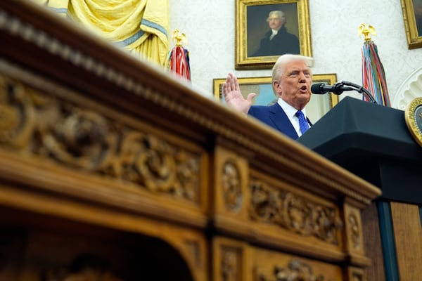 President Donald Trump speaks as Tulsi Gabbard is sworn in as the Director of National Intelligence in the Oval Office of the White House, Wednesday, Feb. 12, 2025, in Washington. (Photo/Alex Brandon)