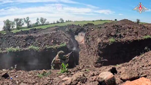 In this photo taken from video distributed by Russian Defense Ministry Press Service on Monday, May 12, 2025, Russian servicemen attend a combat training for assault units in an undisclosed location in Ukraine. (Russian Defense Ministry Press Service via AP)