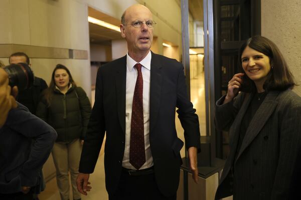 Newly named finance minister Eric Lombard leaves after the handover ceremony Monday, Dec. 23, 2024 in Paris. (AP Photo/Thomas Padilla)