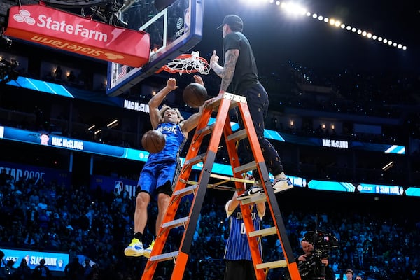 Orlando Magic guard Mac McClung dunks during the slam dunk contest at the NBA basketball All-Star Saturday night festivities Saturday, Feb. 15, 2025, in San Francisco. (AP Photo/Godofredo A. Vásquez)