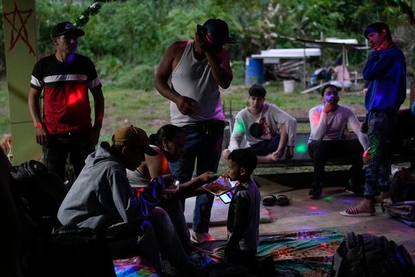 Venezuelan migrants camp out in Puerto Carti, on Panama's Caribbean coast, Saturday, Feb. 22, 2025, before boarding boats to Colombia after turning back from southern Mexico where they gave up hopes of reaching the U.S. amid President Trump's crackdown on migration. (AP Photo/Matias Delacroix)