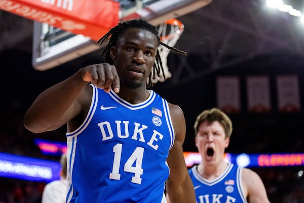 Duke guard Sion James (14) celebrates after scoring against Clemson during the first half of an NCAA college basketball game Saturday, Feb. 8, 2025, in Clemson, S.C. (AP Photo/Scott Kinser)