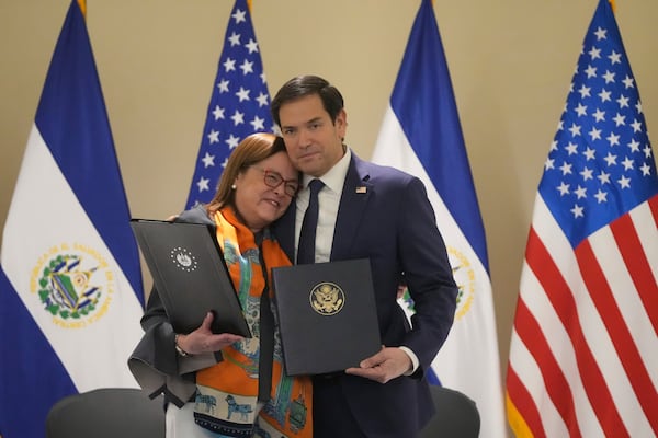 U.S. Secretary of State Marco Rubio, right, and El Salvador's Foreign Minister Alexandra Hill Tinoco pose for a photo after signing a memorandum of understanding regarding civil nuclear cooperation between their countries at the Intercontinental Real Hotel in San Salvador, El Salvador, Monday, Feb. 3, 2025. (AP Photo/Mark Schiefelbein, Pool)