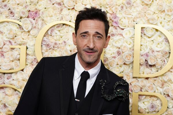 Adrien Brody arrives at the 82nd Golden Globes on Sunday, Jan. 5, 2025, at the Beverly Hilton in Beverly Hills, Calif. (Photo by Jordan Strauss/Invision/AP)