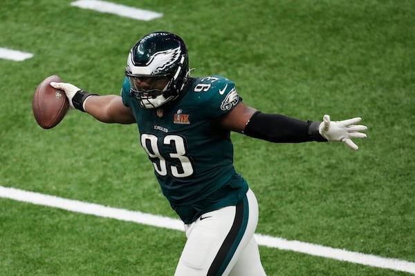 Philadelphia Eagles defensive tackle Milton Williams (93) celebrates his fumble recovery against the Kansas City Chiefs during the second half of the NFL Super Bowl 59 football game, Sunday, Feb. 9, 2025, in New Orleans. (AP Photo/Gerald Herbert)