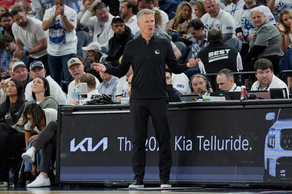 Golden State Warriors head coach Steve Kerr reacts during the second half of Game 2 of an NBA basketball second-round playoff series against the Minnesota Timberwolves, Thursday, May 8, 2025, in Minneapolis. (AP Photo/Abbie Parr)