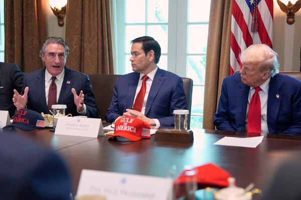 Interior Secretary Doug Burgum speaks during a cabinet meeting at the White House, Wednesday, April 30, 2025, in Washington, as Secretary of State Marco Rubio and President Donald Trump look on. (AP Photo/Evan Vucci)