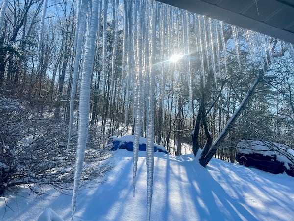 Icicles are shown Sunday, Jan. 12, 2025, on a home in Cross Lanes, W.Va. (AP Photo/John Raby)