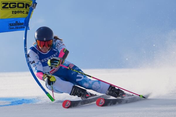 United States' Paula Moltzan competes in a women's giant slalom, at the Alpine Ski World Championships, in Saalbach-Hinterglemm, Austria, Thursday, Feb. 13, 2025. (AP Photo/Giovanni Auletta)