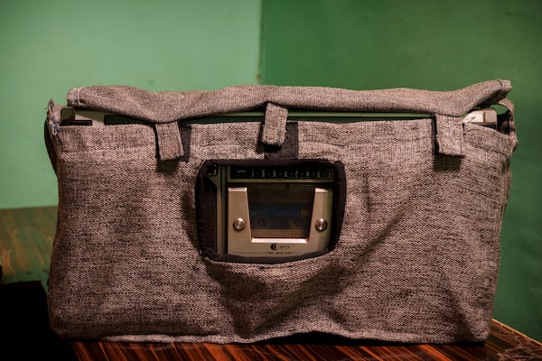 A tape recorder is covered to protect it from dust in a house in Srinagar, Indian controlled Kashmir, Friday, Feb. 14, 2025. (AP Photo/Dar Yasin)